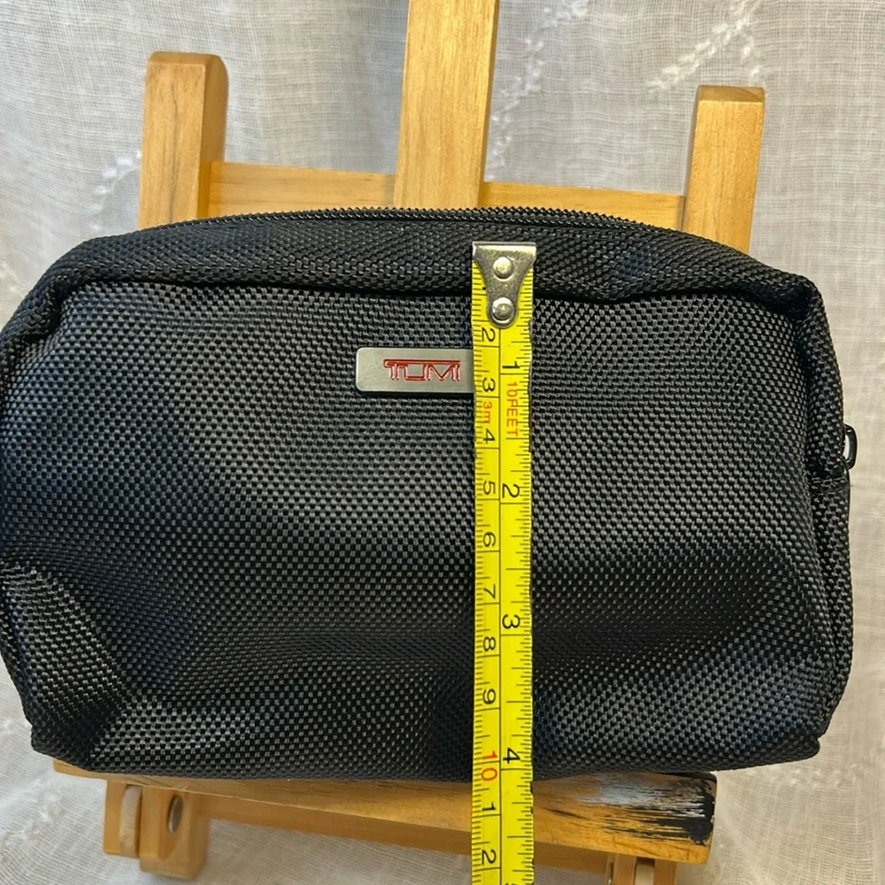 TUMI new never used cosmetic bag with some goodies